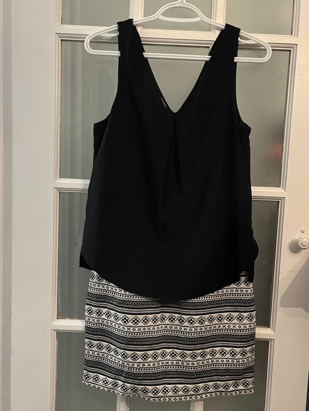 Sleeveless black and white one piece mini dress